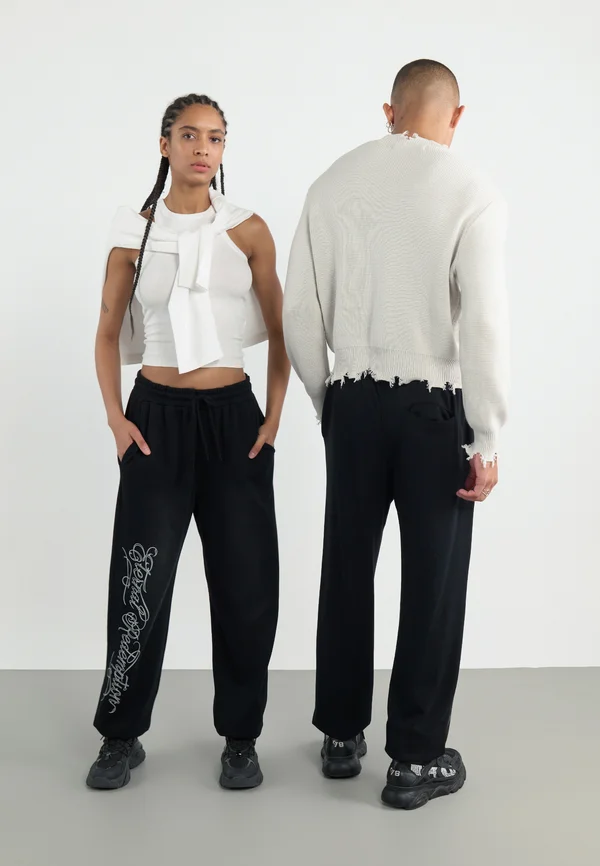 UNISEX - Jogginghose - black