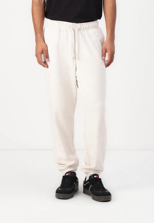 VARSITY - Jogginghose - oat marl