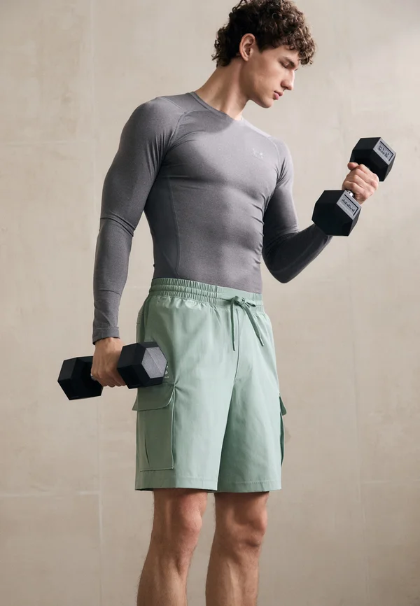 VIBE WOVEN - Kurze Sporthose - silica green