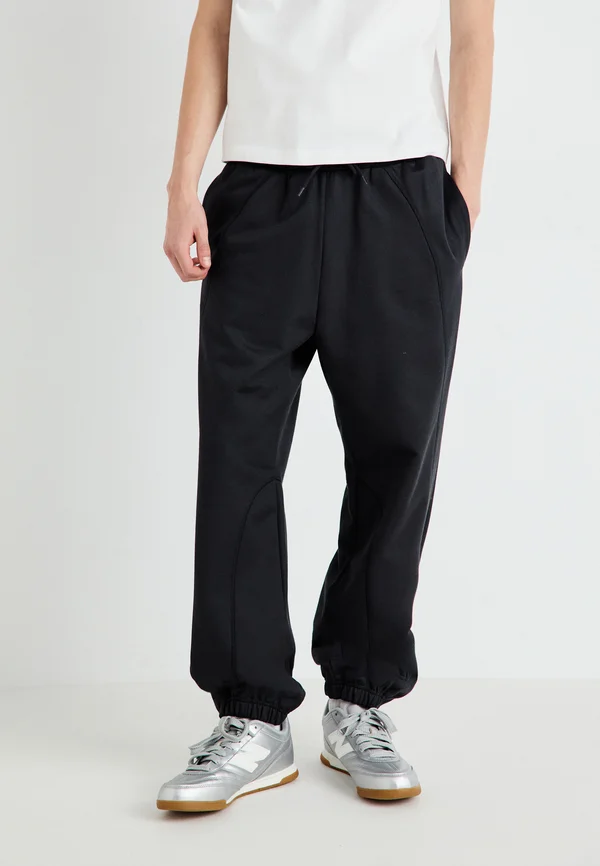WARM UP  - Jogginghose - black