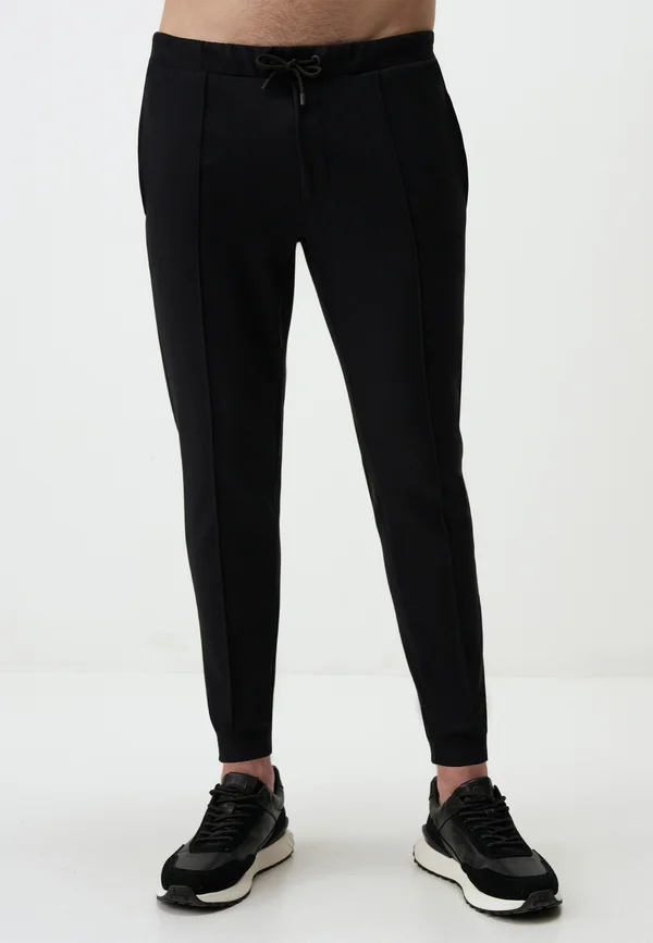 WITH ELASTIC WAISTBAND - Jogginghose - black