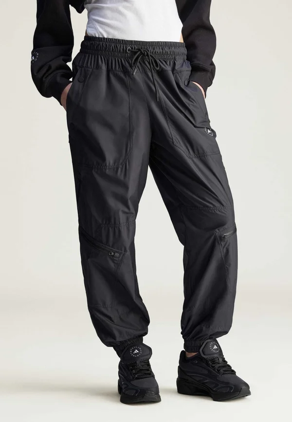 ZIP TRACK PANTS - Stoffhose - black